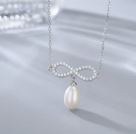 WhatsApp Image 2026-10-19 at 10.53.00 AM Collar de Plata 925 - COLLAR DE PLATA 925 – COLLAR INFINITO CON PERLA C220 - Imagen 1